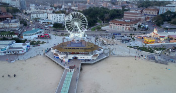 Bournemouth seafront with Ferris wheel and other tourist attractions